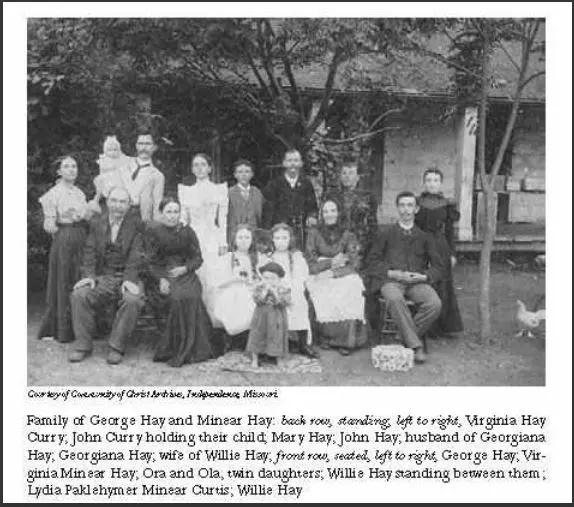 A group of people standing in front of a building.