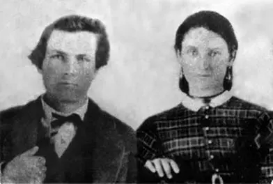 A man and woman standing next to each other.